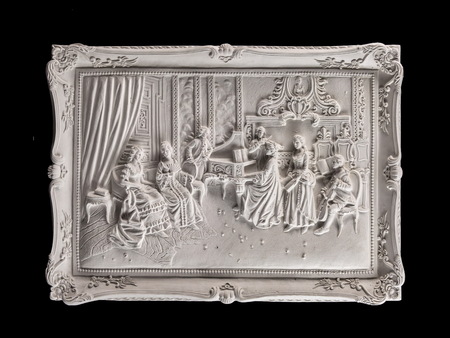 white plaster basrelief classic on a black background