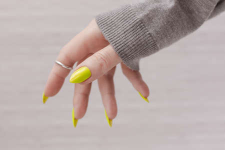 Female hand with long nailsの写真素材