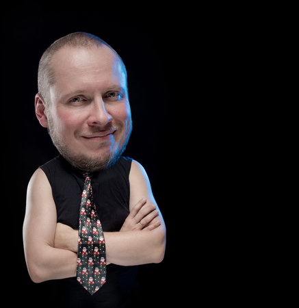 Emotional comic actor gesturing man in a tie on a black background, Christmas and New Year