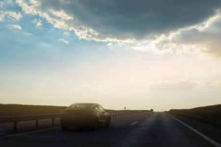 Highway wide road, transport and blue sky with clouds on a summer day