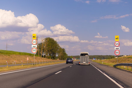 Highway wide road, transport and blue sky with clouds on a summer day
