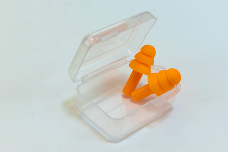 Silicone ear plugs for human ears on white backgroundの写真素材