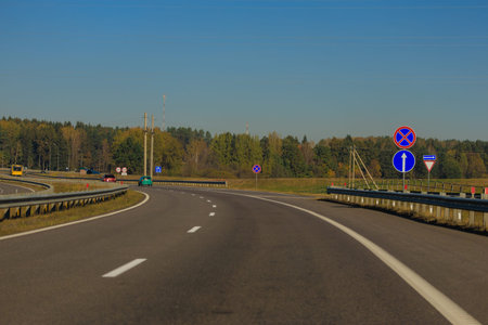 Autumn landscape, road and highway, asphalt and roadside.
