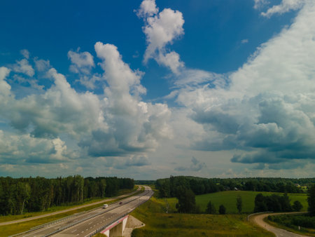 Top view of the roads, landscape and roadside from the height of a flying drone.の写真素材