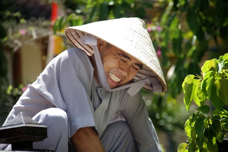 Happy asian man at work on a sunny day.のeditorial素材