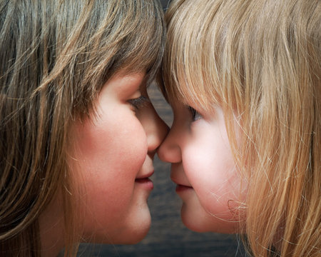 Two sisters - one older and one younger, girlfriend. Girls are very similar to each other. Face...