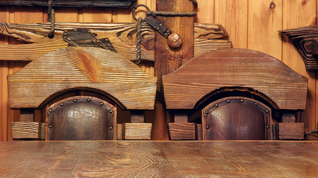 Table, wooden oak chairs. Interior details of hunting village houseの写真素材