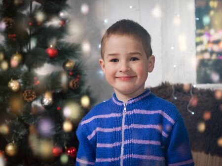 Happy boy in the New year. Sincere emotions of the child. Portraitの写真素材