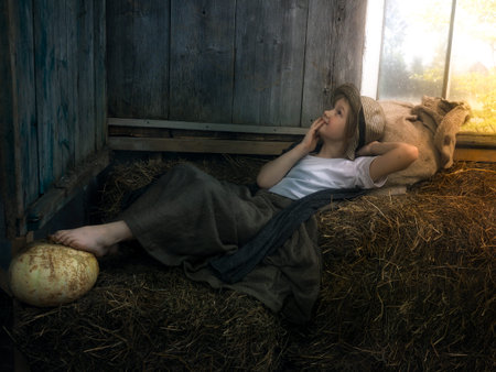 The child dreams. Rustic barn