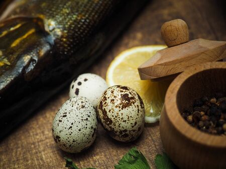 Ingredients for cooking close-up. Quail eggs, lemonの写真素材