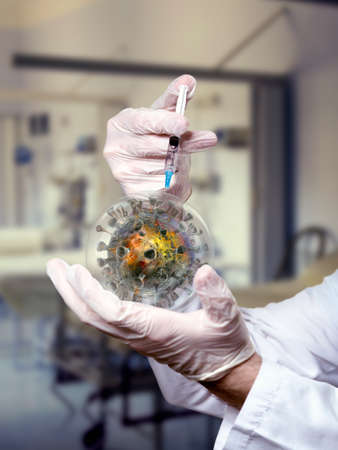 Doctor's hands make a vaccine against the virusの写真素材