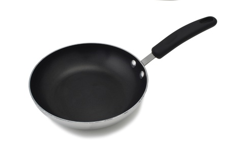 Close-up image of a frying pan over the white backgroundの写真素材