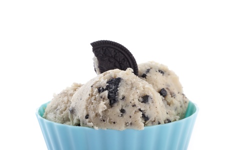 Close-up image of delicious cookies and cream ice cream isolated over the white backgroundの写真素材
