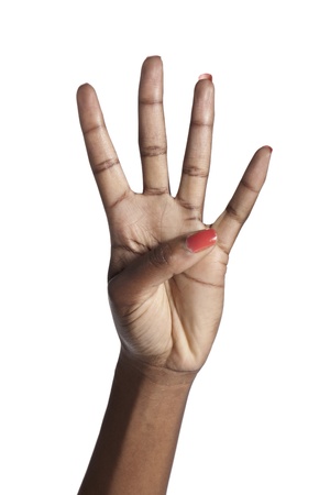 Human hand counting four over a white backgroundの写真素材