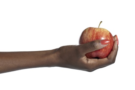 Female hand holding an appleの写真素材