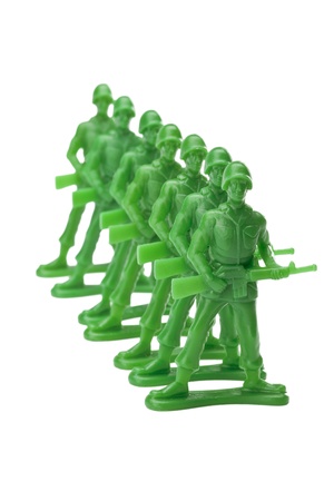 A row of military toys on a white backgroundの写真素材