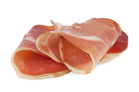 Parma ham slices over a white backgroundの写真素材