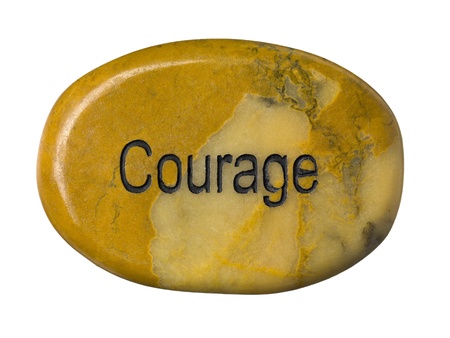 Courage stone isolated on a white backgroundの写真素材