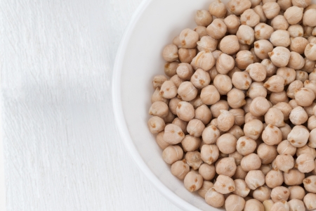 Cropped image of a bowl of dried fresh chickpeasの写真素材