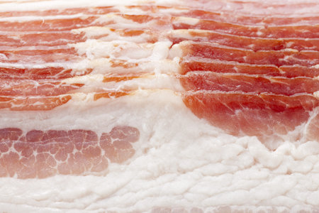 Full frame close-up of raw bacon.