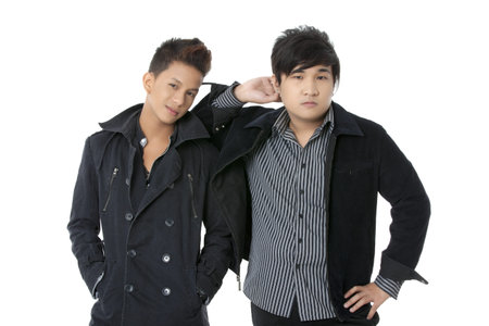 Image of a cool looks of a young Asian models against white background