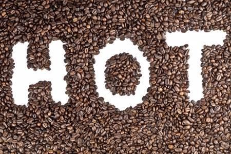 Hot text traced in coffee bean grainsの写真素材
