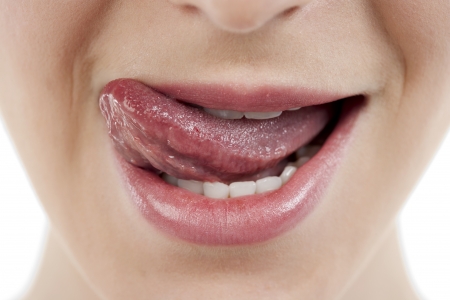 Close up image of woman with her tongue outの写真素材