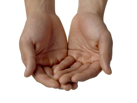 Close up image of male hands cupped together against white background