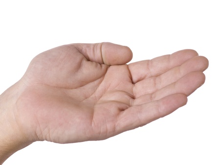 Close-up image of a hand requesting for alms against the white backgroundの写真素材