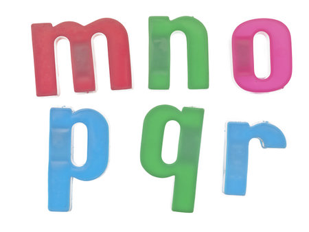 Close-up image of a plastic alphabet letters mnopqr on a white background
