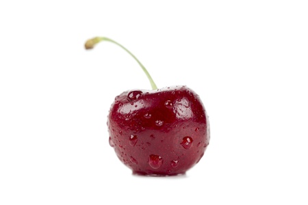 Closed up shot of fresh cherry isolated in a white backgroundの写真素材