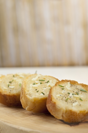 Close up image of toasted slices of bread with garlic and pepperの写真素材