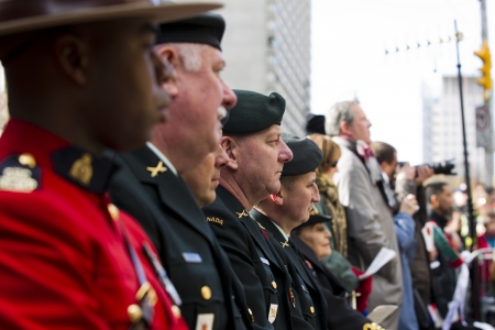 Close-up side view men in uniform standing side by side.のeditorial素材