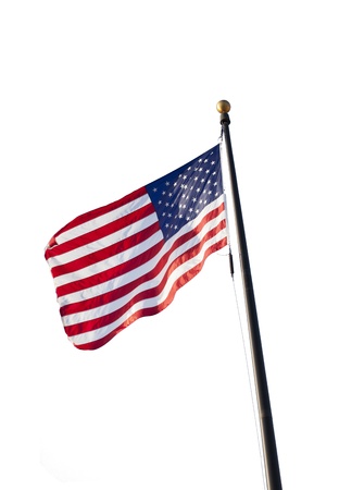 A close-up portrait of US flag on the flag pole isolated on a white backgroundの写真素材