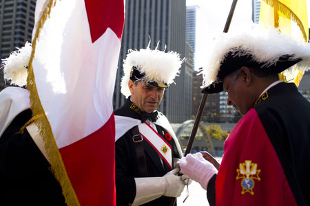Close-up view of marching band with flags and uniform.