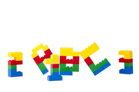Image of an alphabet and numbers made of lego blocks on a white background