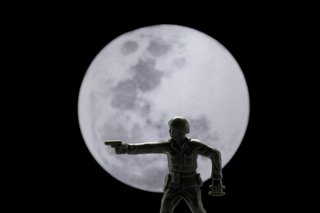 Close-up image of a brave soldier fighting against the moonの写真素材