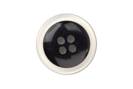Sewing button with four hole isolated in a white backgroundの写真素材