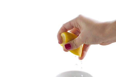 Lemon squeezed imageの写真素材