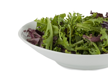 A bowl of Green salad in a cropped imageの写真素材