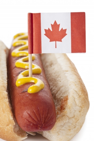 Close-up image of a hotdog sandwich with Canada flag on a white backgroundの写真素材