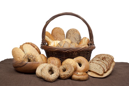 Yummy set of baked bread arranged on top of a brown matの写真素材