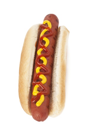 Grilled hotdog with mustard and ketchup on a bunの写真素材