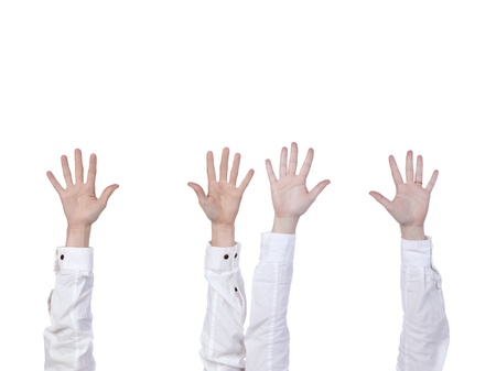 Hands raised over the white backgroundの写真素材