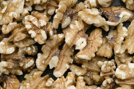 Close-up image of salted walnuts background