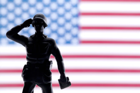 Soldier saluting and giving honor on his country