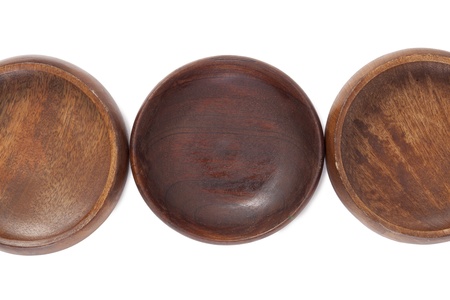 Close up image of three wooden bowl against white backgroundの写真素材