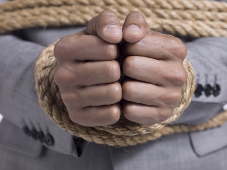 Close-up image of a tied hand of a maleの写真素材