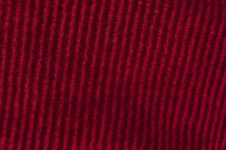 Maroon Corduroy fabric in a macro image
