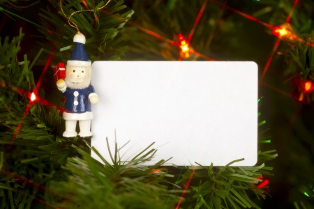 Christmas ornament and white pad on Christmas treeの写真素材